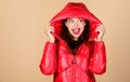 Snow or rain I am ready for both. Girl enjoy wearing bright jacket with hood. Warm coat. Comfortable down jacket. Red