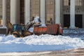 Snow removal in front of the building of the art center \