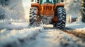 Snow Removal Operations after Heavy Snowfall.Winter Tractor Clearing Snowy Road