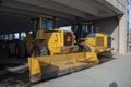 Snow Removal Plow and Wheel Loader in CIty Parkade