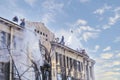 Snow removal from rooftop avalanche icicle winter dangerous ice workers safety