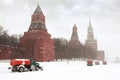 Snow-remover trucks on road near Kremlin