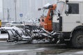 Snow removing equipement in the street in blizzard. Royalty Free Stock Photo