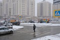 Snow removing equipement on the street in blizzard. Trucks with snowplow on winter city streets. Royalty Free Stock Photo