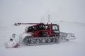 Snow removing machine on mountain slope