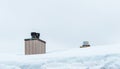 Snow on the roof of restuarant in ski resort