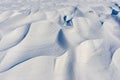 Snow shapes covering earth when windy weather at winter