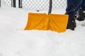 Person Shoveling Snow off Walk Way