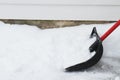 Snow Shovel on the driveway Royalty Free Stock Photo