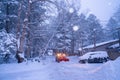 snow shovel tractor on a heavy snowy day at Heike No Sato Village in Tochigi Prefecture, Nikko City, JAPAN. soft focus