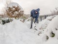 Snow shoveling after heavy snowfall