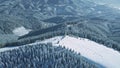 Snow ski slope resort at mountain aerial. Active sport and recreation. Nobody nature landscape