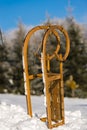 Snow sledge standing in winter countryside