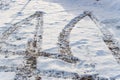 Snow and slush footprints on the road Royalty Free Stock Photo