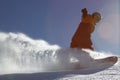 Snow splashes under snowboarder Royalty Free Stock Photo