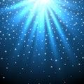 Snow and stars are falling on the background of blue luminous rays. Royalty Free Stock Photo