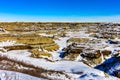 Snow starts to melt in Horseshoe Canyon, Drumheller, Alberta, Canada