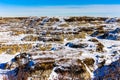 Snow starts to melt in Horseshoe Canyon, Drumheller, Alberta, Canada