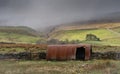 A snow storm approaches an old tin shed near Garrigill,, Cumbria