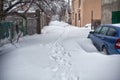 Snow storm hits city. street after blizzard