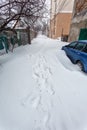 Snow storm hits city. street after blizzard