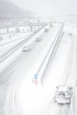 Snow storm on the roads in December in Kiev, Ukraine. Snowy and nothing visibility on the street