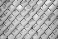 Snow stuck on chainlink fence enclosure after snow fall Royalty Free Stock Photo