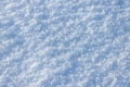 Snow surface close-up. Winter background with snow texture and snowflakes on the ground. Royalty Free Stock Photo