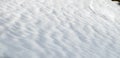 Fresh fluffy snow texture, beauty of light and shadow Royalty Free Stock Photo