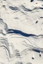 Snow top view. The texture of the snow crust. Winter light background in a blue shade. Royalty Free Stock Photo