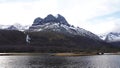 Snow topped mounains above Innerdalsvatnet in Innerdalen valley in Norway in autumn