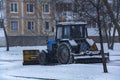 During snow tractor brands Belarusian cleans the pavement by snowfall