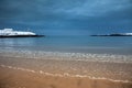 Snow on Trearddur Bay Beach in winter Isle of Anglesey North Wales Royalty Free Stock Photo