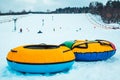 snow tubing rings close up. hill on background Royalty Free Stock Photo