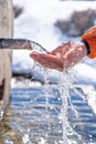 Snow water flowing from fountains, ice-cold fresh, fresh and healthy natural drinking water Royalty Free Stock Photo