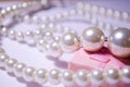 Luxurious pearl jewelry on a pink box. Snow-white pearls. Bijouterie. Jewelry. Snow-white beads on a white background. Brilliant p Royalty Free Stock Photo