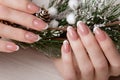 Snow White manicure on female hands. Winter nail design. Royalty Free Stock Photo