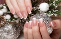 Snow White manicure on female hands. Winter nail design. Royalty Free Stock Photo