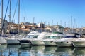 Snow-white sailing yachts in a marina in Marseille on a bright sunny day. Beautiful view Royalty Free Stock Photo
