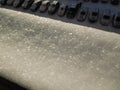 Snow on the windowsill, top view from the window