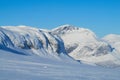 Snow winter in the mountains beyond Northern polar circle, Kebnekaize mountain summit