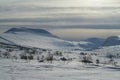 Snow winter in the mountains beyond Northern polar circle, Kebnekaize mountain summit