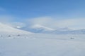 Snow winter in the mountains beyond Northern polar circle