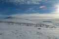 Snow winter in the mountains beyond Northern polar circle, Kebnekaize mountain summit