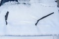 Snow and wipers on front windshield