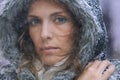 Snow, woman and portrait in nature with cold climate and weather with winter fashion and idea. Ice, travel and freezing Royalty Free Stock Photo