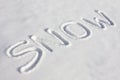 SNOW Written In A Snowy Field Royalty Free Stock Photo