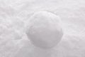 Snowball on snow background.