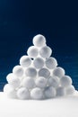 Snowballs heap on dark blue background