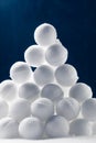 Snowballs heap on dark blue background